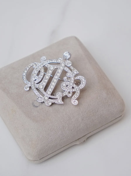 Chr Dior logo brooch embellished with rhinestones (Vintage)