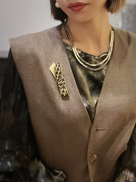 Vintage Christian Dior raffia bow houndstooth brooch | ON SLOWNESS