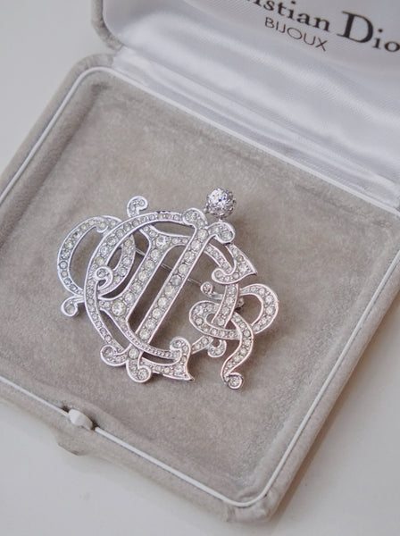 Chr Dior logo brooch embellished with rhinestones (Vintage)
