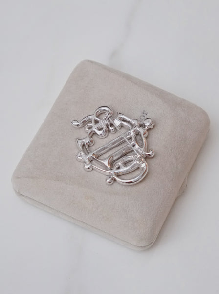 Chr Dior logo brooch embellished with rhinestones (Vintage)