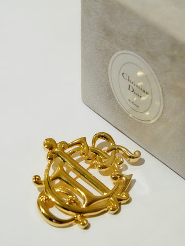 vintage Christian Dior logo brooch | on slowness
