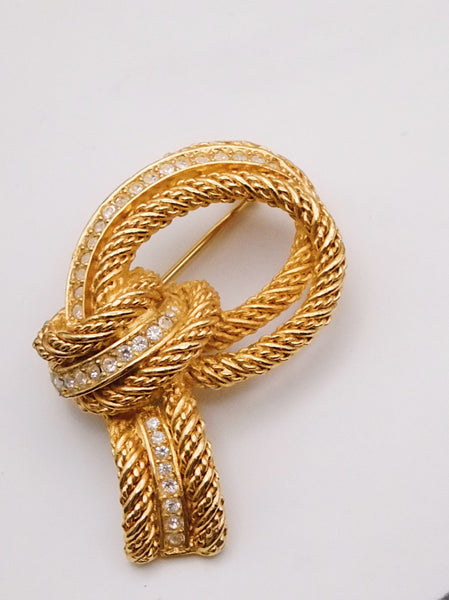 Pre-owned vintage Christian Dior textured knot brooch | on slowness