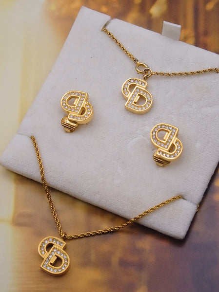 Pre-owned Vintage Christian Dior CD necklace, bracelet and clip on earrings | on slowness