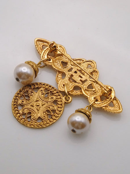 Pre-owned vintage Sonia Rykiel brooch | on slowness