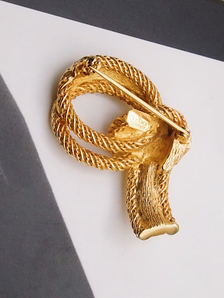 Pre-owned vintage Christian Dior textured knot brooch | on slowness