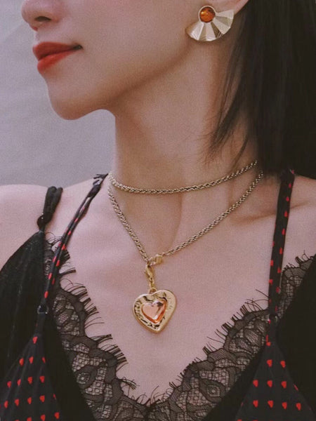 YSL Yves Saint Laurent heart pendant (Vintage)