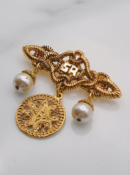Pre-owned vintage Sonia Rykiel brooch | on slowness