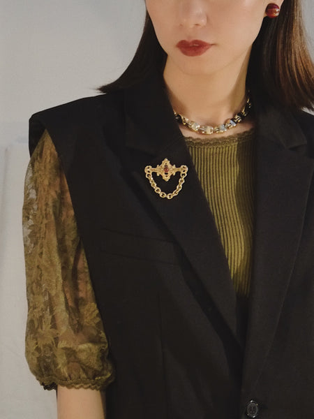 Pre-owned vintage DKNY bar brooch | on slowness