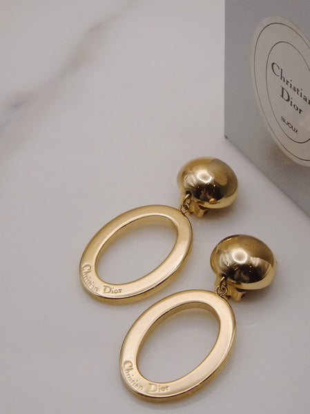 Pre-owned vintage statement Christian Dior golden hoop earrings | on slowness