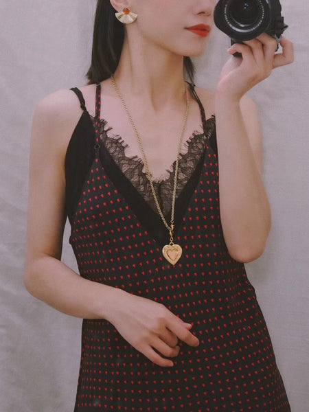 YSL Yves Saint Laurent heart pendant (Vintage)