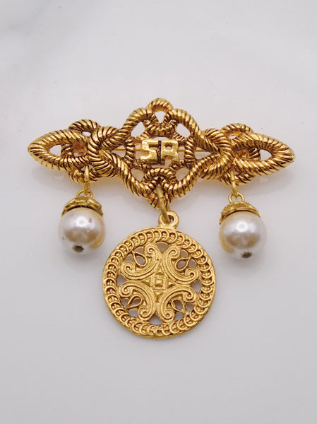 Pre-owned vintage Sonia Rykiel brooch | on slowness