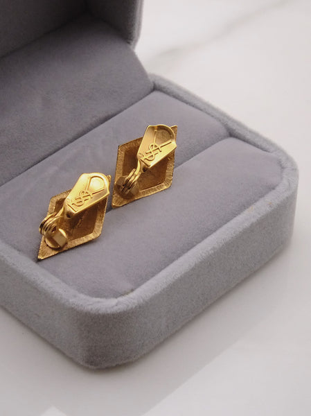 YSL Yves Saint Laurent golden pyramids clip on earrings (vintage)
