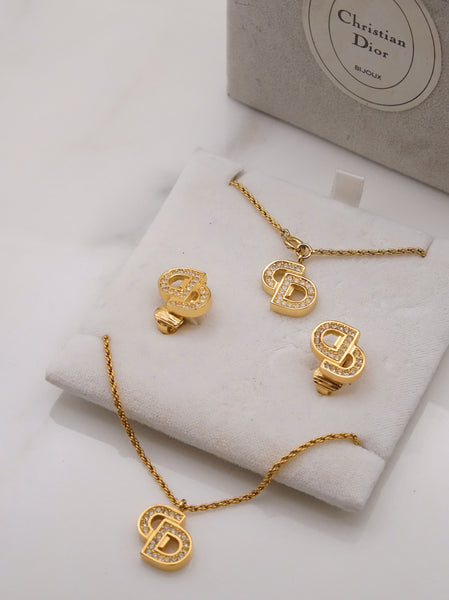 Pre-owned Vintage Christian Dior CD necklace, bracelet and clip on earrings | on slowness