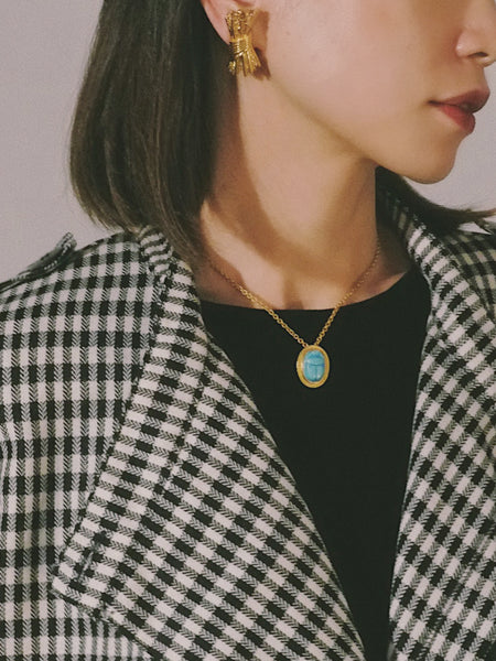 Pre-owned vintage Nina Ricci golden textured barks clip on earrings | on slowness