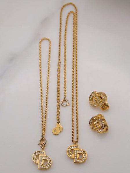 Pre-owned Vintage Christian Dior CD necklace, bracelet and clip on earrings | on slowness