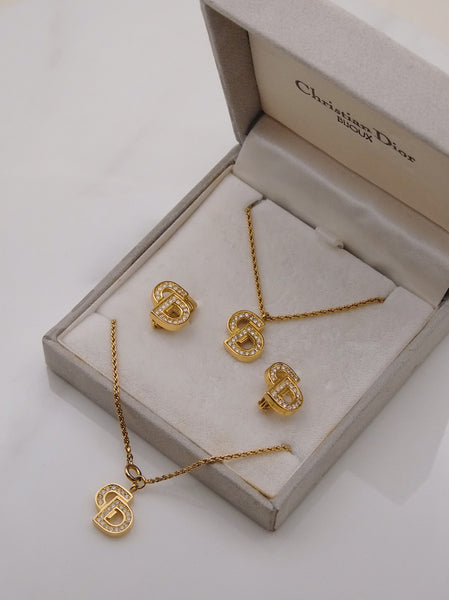 Pre-owned Vintage Christian Dior CD necklace, bracelet and clip on earrings | on slowness